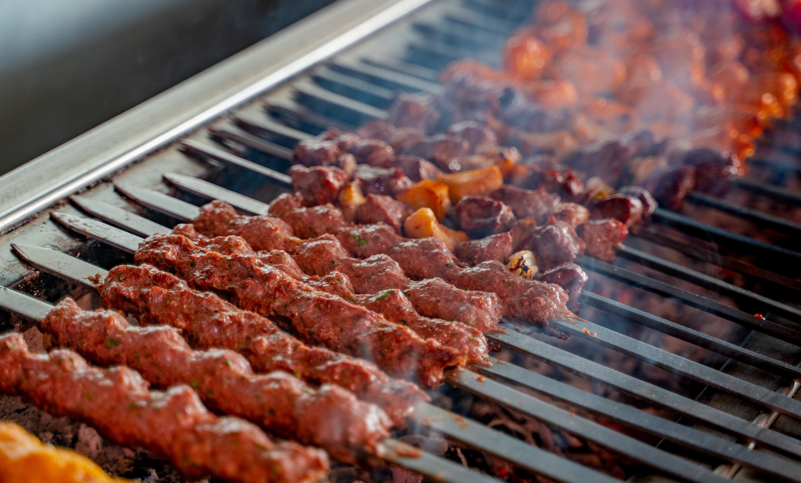 tikka, shish & kofta kebabs on charcoal barbeque